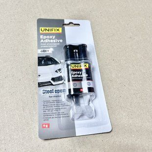 Клей епоксидний двокомпонентний для металу шприц 6 г Unifix Сірий. 940029 940029 фото